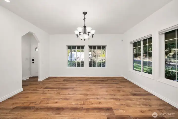 The dining room is spacious w/ plenty of room for large gatherings and great natural lighting and view from the windows.