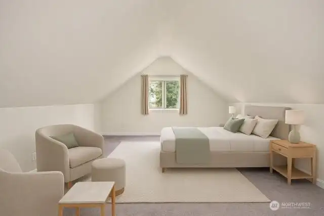 MIL Bedroom upstairs. The upstairs is HUGE and has a seperate entrance through the garage.