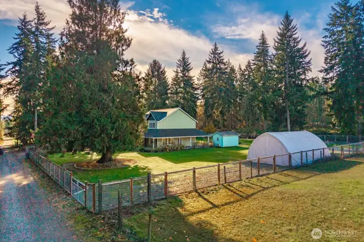 The fencing and gates are all new, seller spent 60k on them. The white extra storage area is also new (4k) for storing outdoor equipment or whatever you would want to use it for.