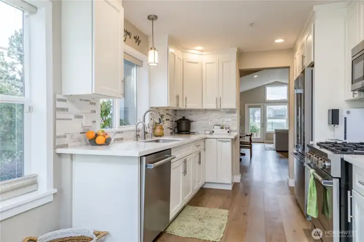 Modern convenience meets style with custom top-down/bottom-up shades that perfectly filter the abundant natural light