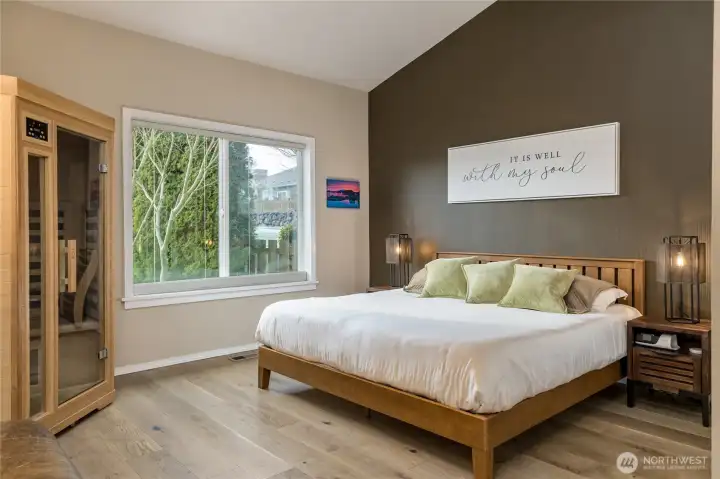 Primary suite features vaulted ceiling and a large window overlooking the back yard. Infrared sauna is negotiable!