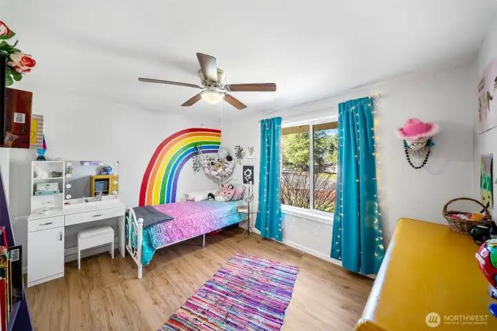 Bedroom #3 with some character! Nice ceiling fan and large sunny window