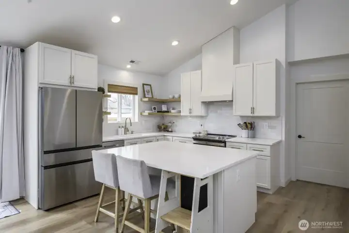 The appliances stay with the home.  Notice the newer high end refrigerator