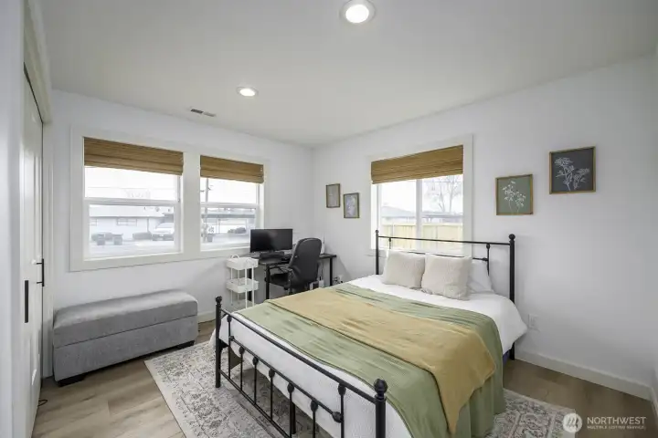 The primary offers both natural light and black-out blinds for sleeping even during the day