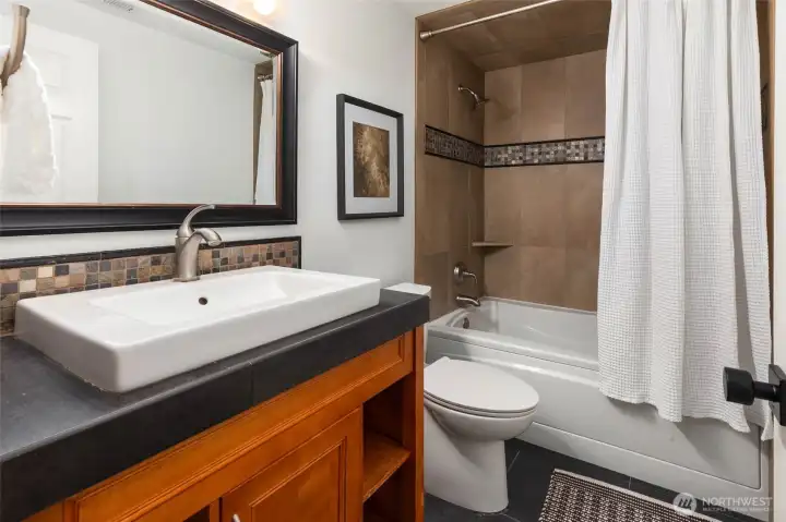 Lower-level full bathroom.