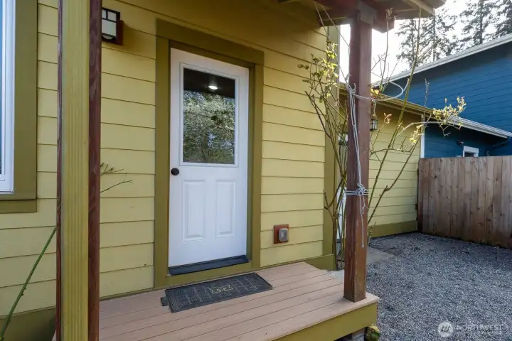 Back door of townhouse enters great room. New Trek decking added March 2026.