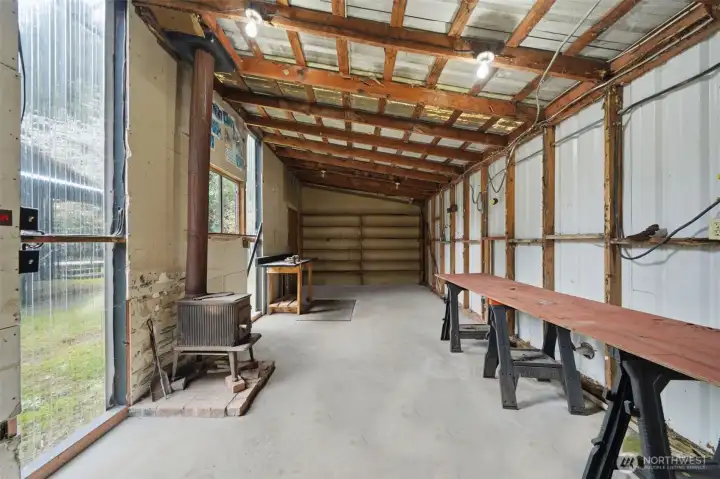 Massive detached shop/studio space, perfect for hobbies or professional projects.