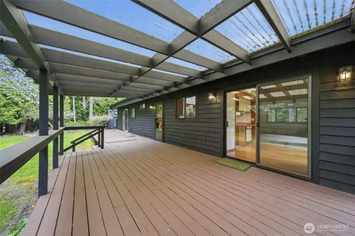 Large wrap-around deck offers the perfect spot for morning coffee or evening BBQs.