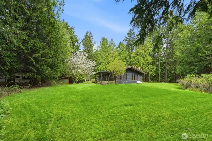 Peaceful park-like setting with well-maintained landscaping.