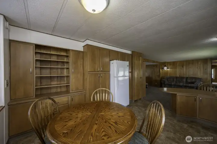 Dining Area space fits a large table with plenty of cabinet storage!