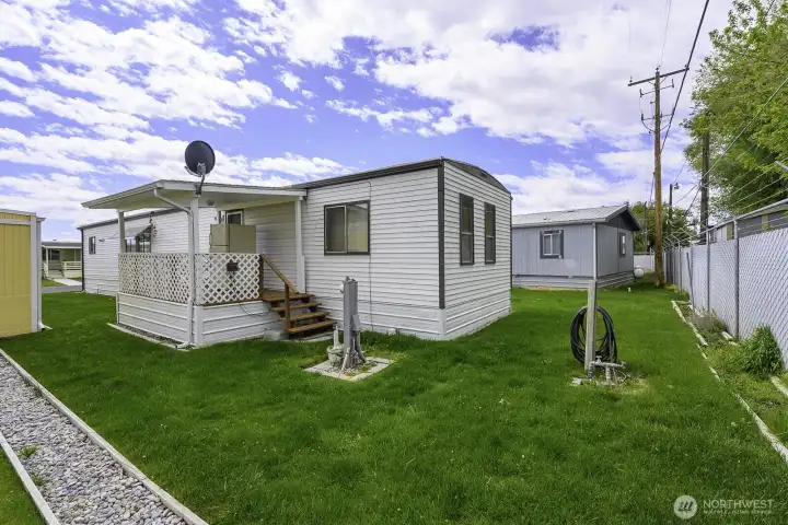 2nd covered deck on backside of home leading to side/back yard