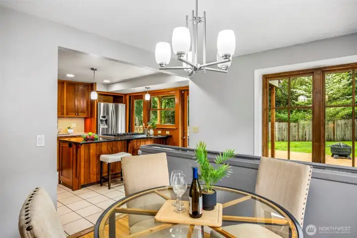 Large Windows bring in natural light to Dining and Kitchen from South