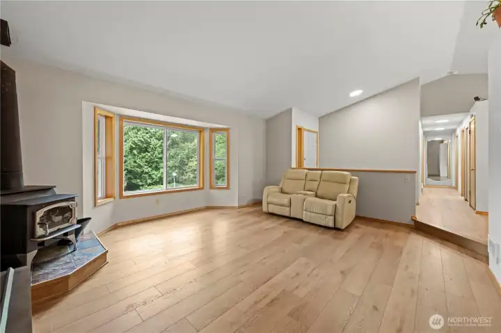 Original living room, featuring beautiful luxury vinyl planking (LVP).