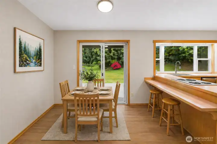 Virtually stage eat-in kitchen.