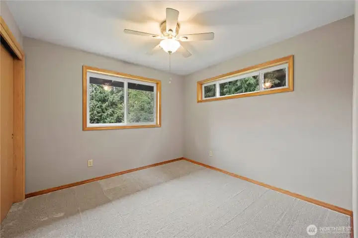 Original second bedroom features amazing window over the bed, just like in the primary.