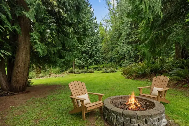 The firepit is calling you to enjoy the cozy spot for a glass of wine or toasting marshmallows.