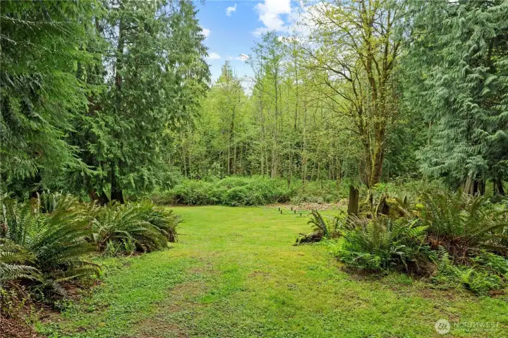 The well maintained mature landscaping feels like you are at a retreat.