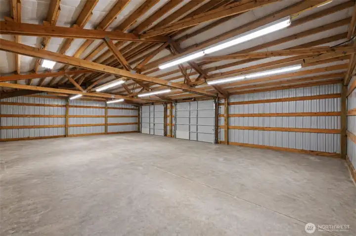 Virtually cleaned shop does not show the wood stove, or some items that will convey with the home. (See list in supplements)