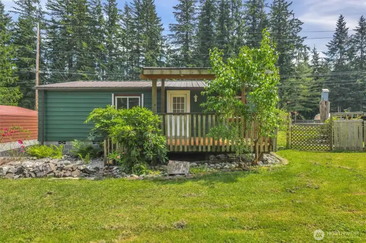 Private & set back. Back of the property buts up to Pipeline Rd. Front door faces North