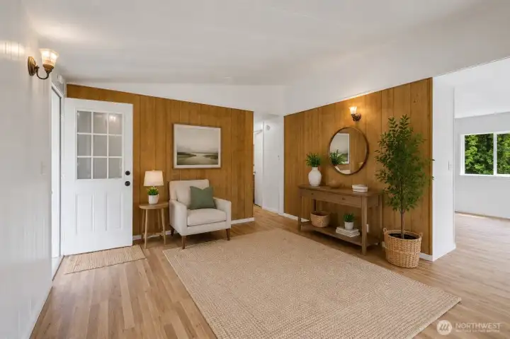 Inviting & light filled living room with vaulted ceilings (AI Staged)