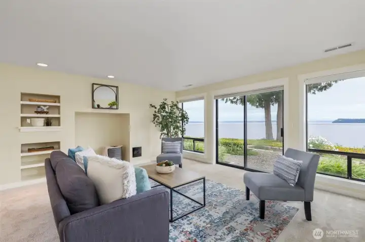 Lower level living area and access to the backyard. Lower level living area and access to the backyard.