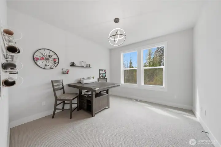 This is one of the three 2nd floor bedrooms reimagined into a craft room