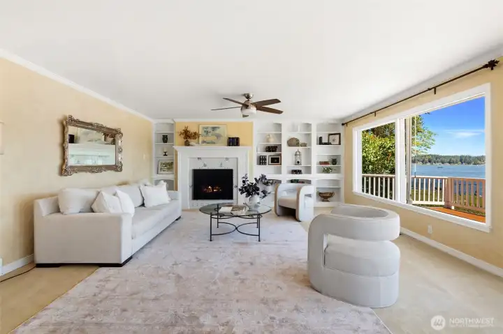 Spacious living room with elegant built-ins and fireplace