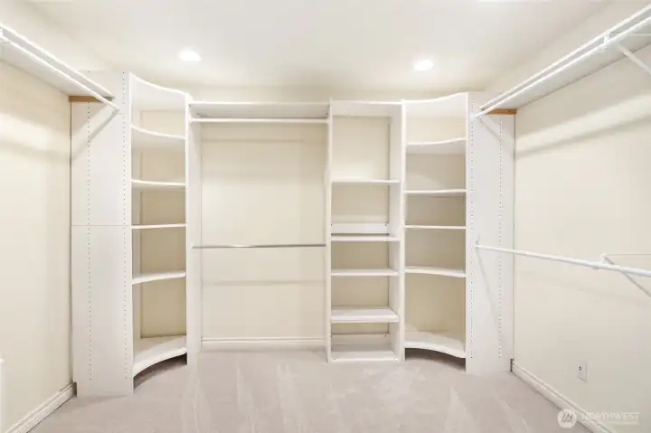 Large walk-in closet with built-ins are great for