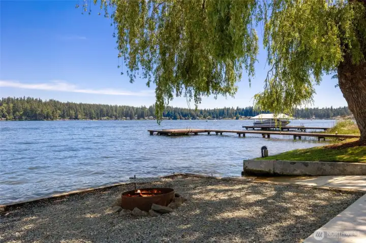 Enjoy a fire next to the lake.