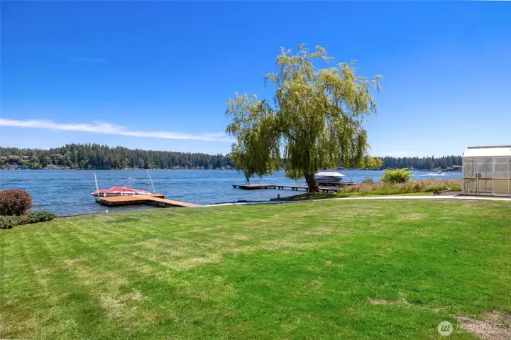 Huge grassy backyard ready for on land activities.