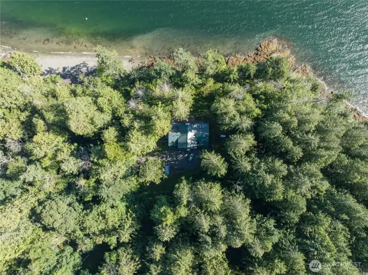 This Con Russell built home was tucked into the woods with great care to preserve the forest surrounding it. Tucked in, but welcomes glorious views and light. This Con Russell built home was tucked into the woods with great care to preserve the forest surrounding it. Tucked in, but welcomes glorious views and light.