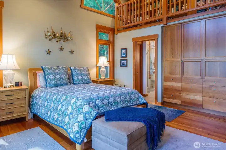 Beautiful built in closets and cabinets. Upper library reading loft is open to the room with the spectacular view. Access the upper loft through the upper ensuite. Beautiful built in closets and cabinets. Upper library reading loft is open to the room with the spectacular view. Access the upper loft through the upper ensuite.