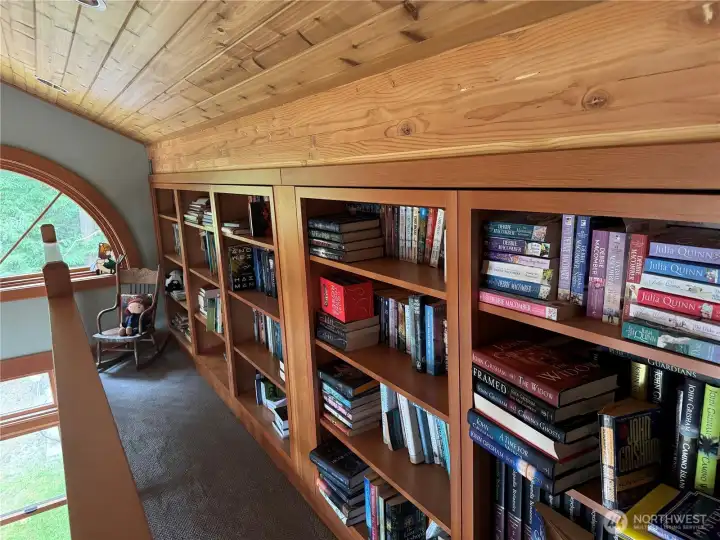 Library reading loft overlooks the main ensuite with the view. Library reading loft overlooks the main ensuite with the view.