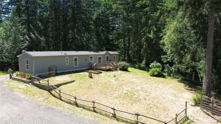 Large fenced front yard.