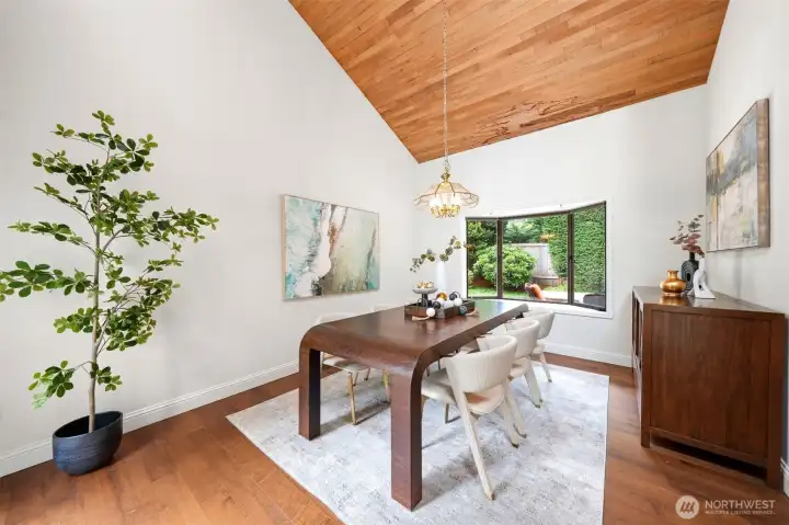 Elegant dining room with backyard views & front patio access.