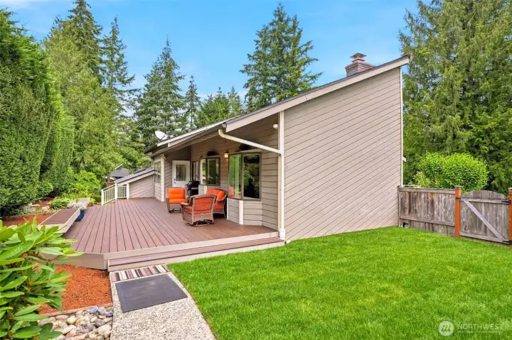 Spacious side yard offering privacy and room to gather