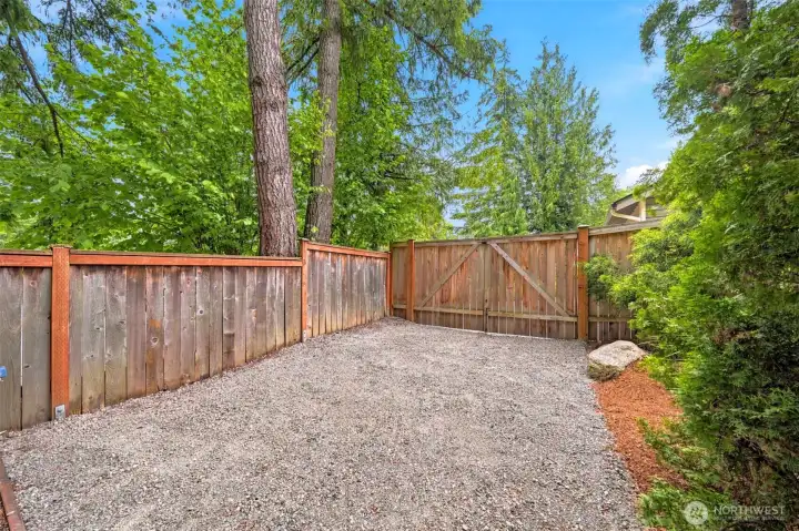 Gated side parking perfect for toys, trailer or extra storage