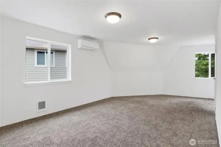 Large and versatile main-level bedroom with easy access to the full bathroom, making it ideal as a primary suite, guest retreat, or home office. Large and versatile main-level bedroom with easy access to the full bathroom, making it ideal as a primary suite, guest retreat, or home office.