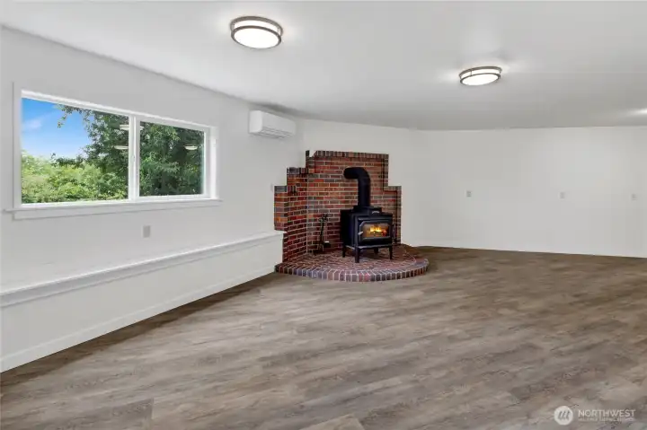 This lower level spacious living room is a blank canvas, offering unlimited potential for entertaining, hobbies, a home office, or additional living space. This lower level spacious living room is a blank canvas, offering unlimited potential for entertaining, hobbies, a home office, or additional living space.