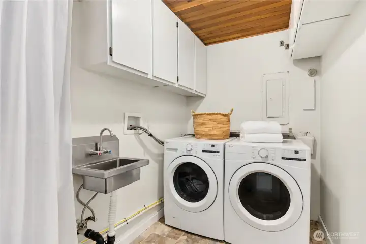 Utility room located downstairs.