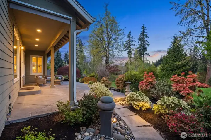 Sophisticated English gardens surround every corner of this masterfully designed home Sophisticated English gardens surround every corner of this masterfully designed home