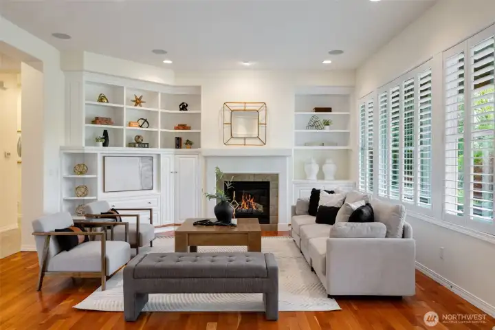 Cozy gas fireplace flanks one end of the spacious living room Cozy gas fireplace flanks one end of the spacious living room