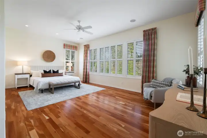 Spacious Primary suite with 10 ft ceilings and walls of windows facing your private backyard Spacious Primary suite with 10 ft ceilings and walls of windows facing your private backyard