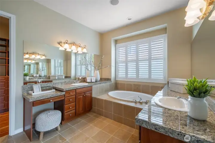 Five piece primary suite with large soaking tub, dual vanities, and separate shower Five piece primary suite with large soaking tub, dual vanities, and separate shower