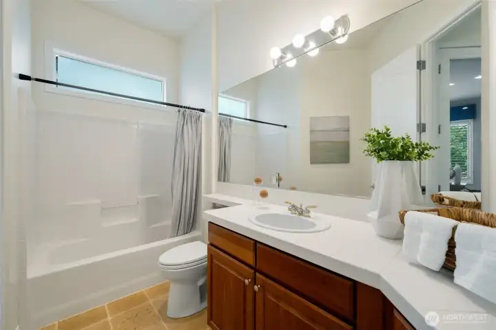 Full hall bathroom, located off the 3rd bedroom/office & nearby entry Full hall bathroom, located off the 3rd bedroom/office & nearby entry