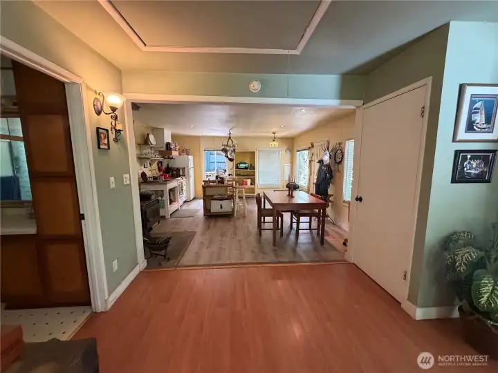View of kitchen & dining room from Living room. View of kitchen & dining room from Living room.