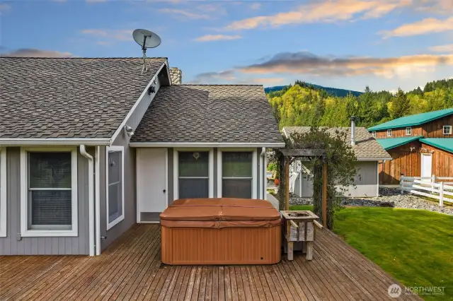 Sundance Hot tub on 5/4 cedar deck with easy access to the prime bedroom.