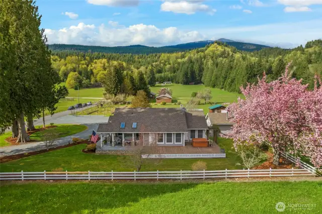Home looking North. Home is nearly fully fenced with large deck to enjoy views in every season.