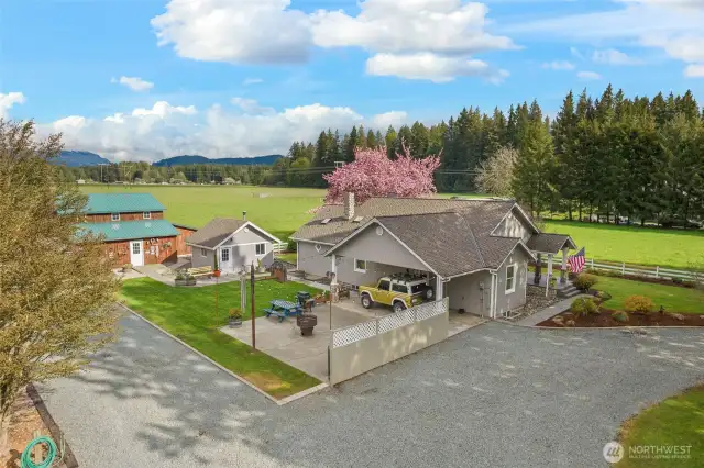 View looking south east with circular driveway entrance.