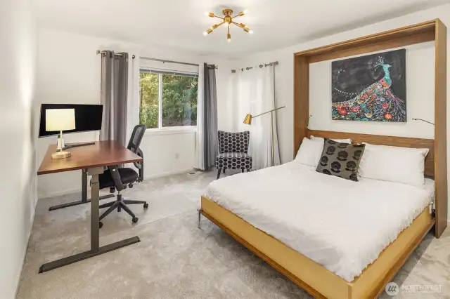 All secondary bedrooms are a good size. This is currently used as an office and temporary guest bedroom with a Murphy Bed. NOTE: Murphy Bed WILL NOT stay with the home.